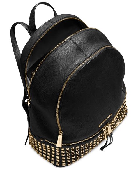 black and gold michael kors backpack|michael kors black camo backpack.